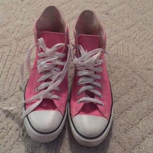 Converse Chuck Taylor high tops.